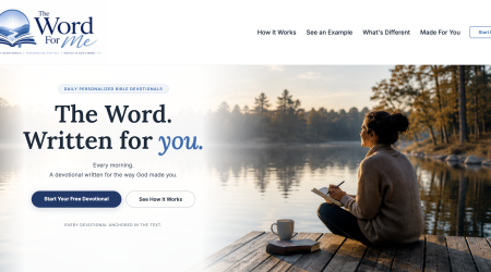 A woman sits on a dock by a lake, writing in a notebook.